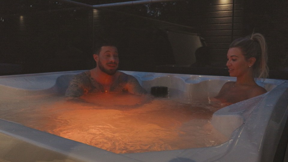 Christine McGuinness and Duncan James in a hot tub.