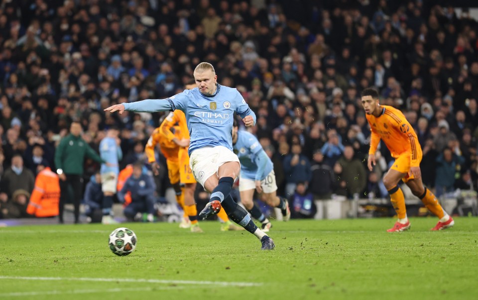 Erling Haaland of Manchester City scoring a penalty kick.