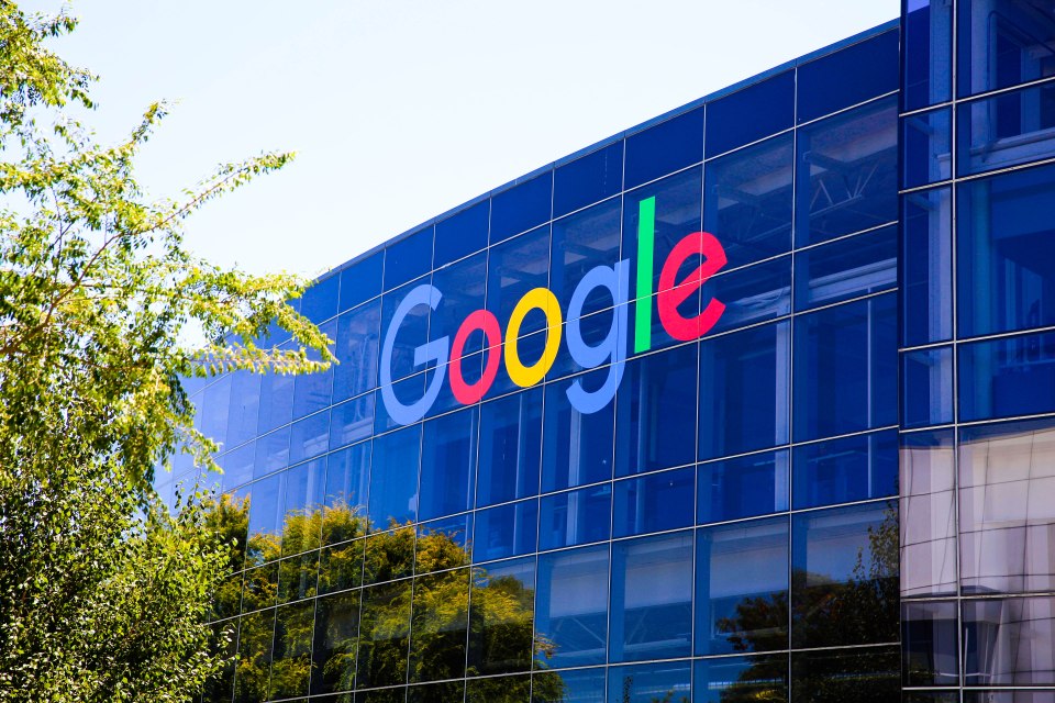Google logo on a glass building.