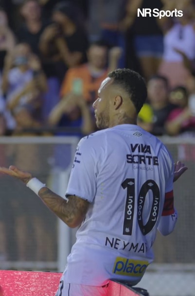 Neymar Jr. celebrating after a soccer game.