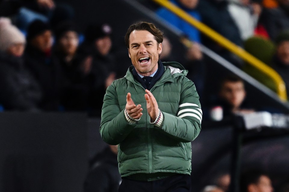 Scott Parker, Burnley manager, applauding from the sidelines.