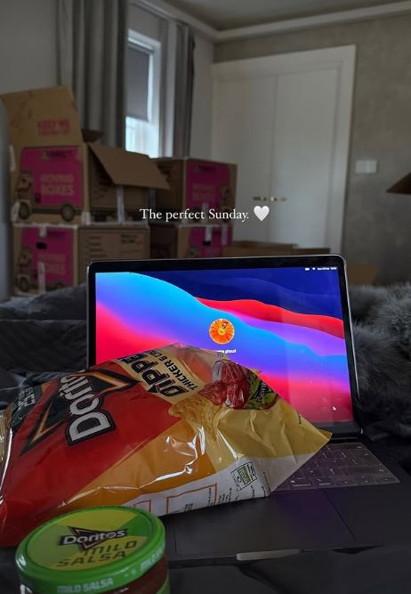 Laptop with snacks and caption "The perfect Sunday."