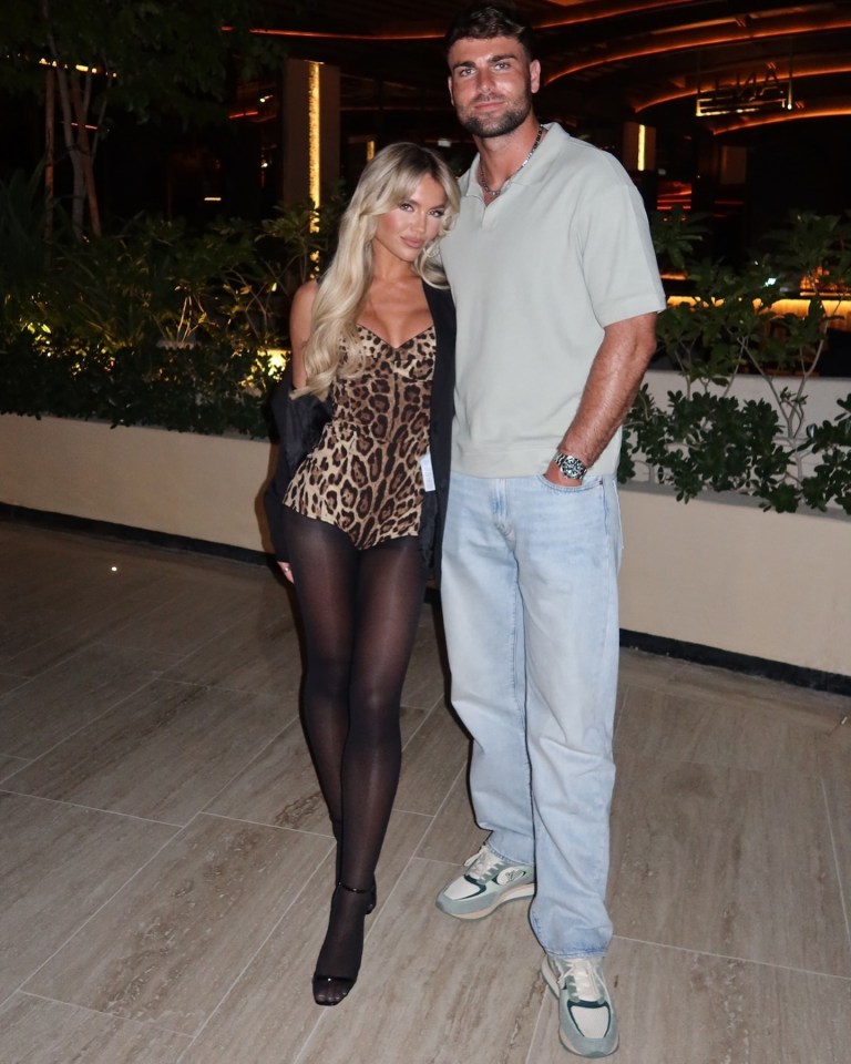 Photo of Molly Smith and Tom Clare posing together.