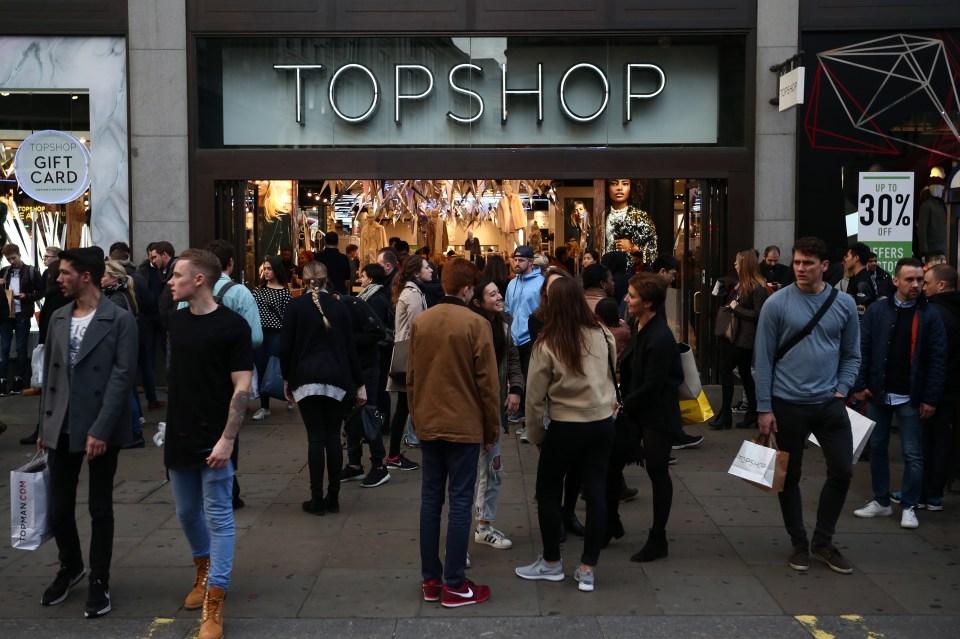 Shoppers outside a Topshop store in London.