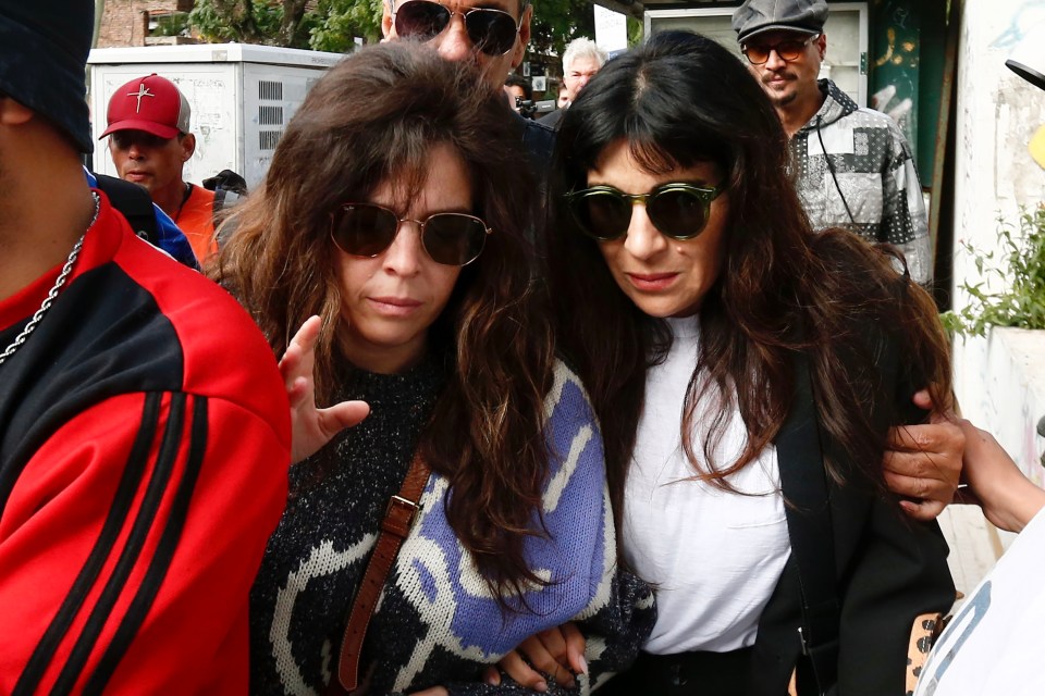 Dalma and Gianinna Maradona, daughters of Diego Maradona, arrive at a courthouse.