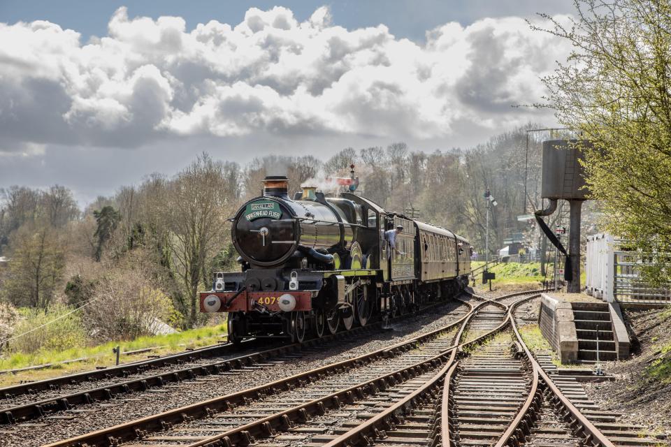 Steam train arriving at Highley station.