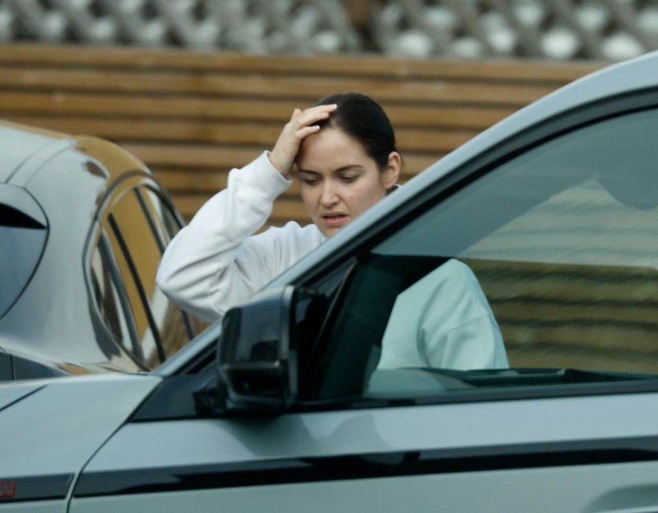 Jacqueline Jossa getting into a car.
