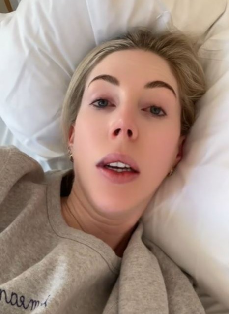 Katherine Ryan lying in bed.