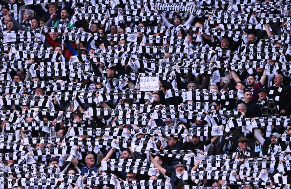 LONDON, ENGLAND - MARCH 16: A general view of Newcastle United fans holding up scarves in support as a sign reading "Murph U R World Class" is seen prior to the Carabao Cup Final between Liverpool and Newcastle United at Wembley Stadium on March 16, 2025 in London, England. (Photo by Stu Forster/Getty Images)