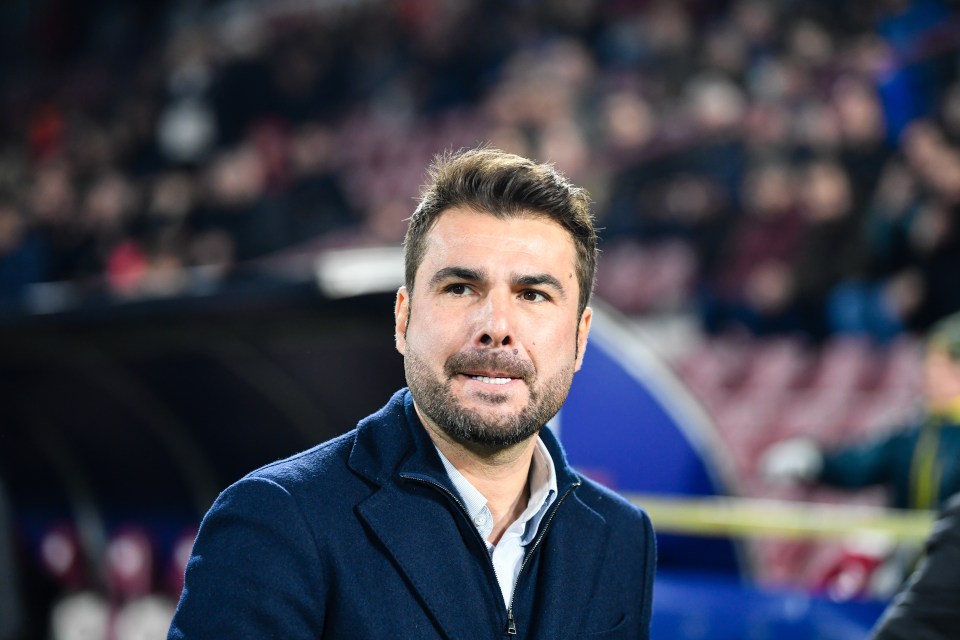 Adrian Mutu at a soccer match.