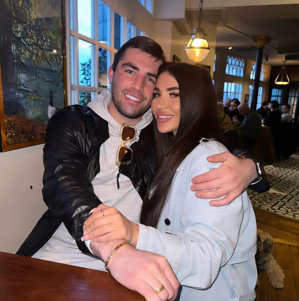 Jack Fincham and Chloe Brockett cuddling.