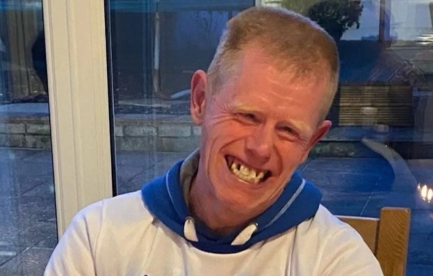 Portrait of Darren Orme smiling.