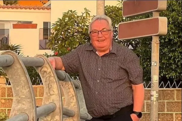 Graham Whyte, BBC Radio star, leaning on a railing.