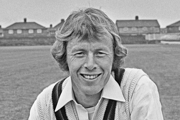 Black and white photo of Peter Lever, a Lancashire County Cricket Club player, smiling.