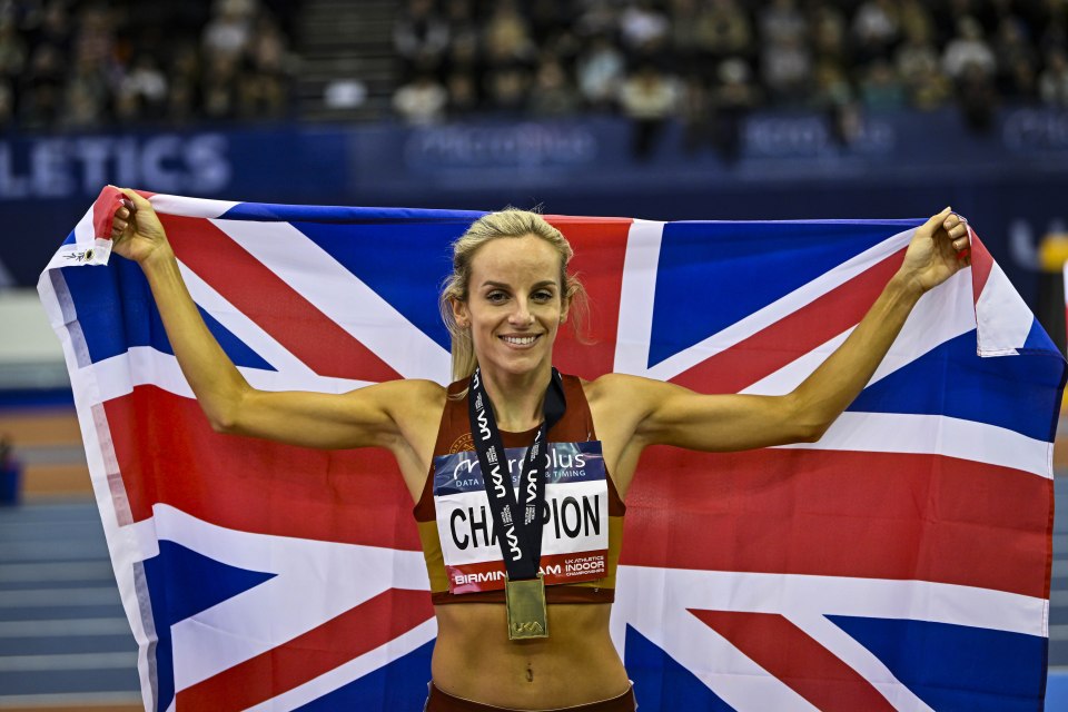 Athlete holding a British flag and a gold medal.