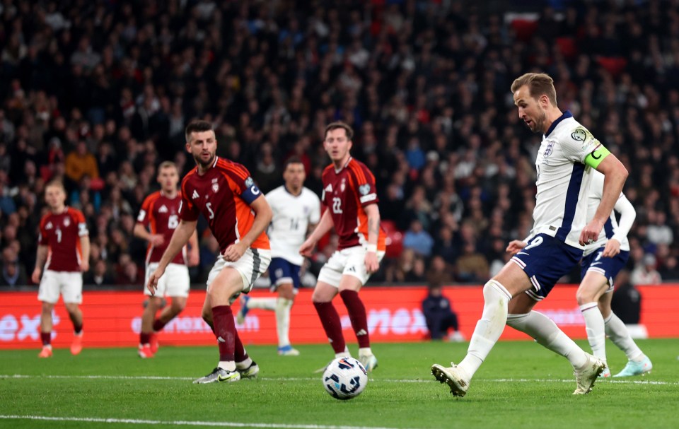 Harry Kane scoring a goal for England.