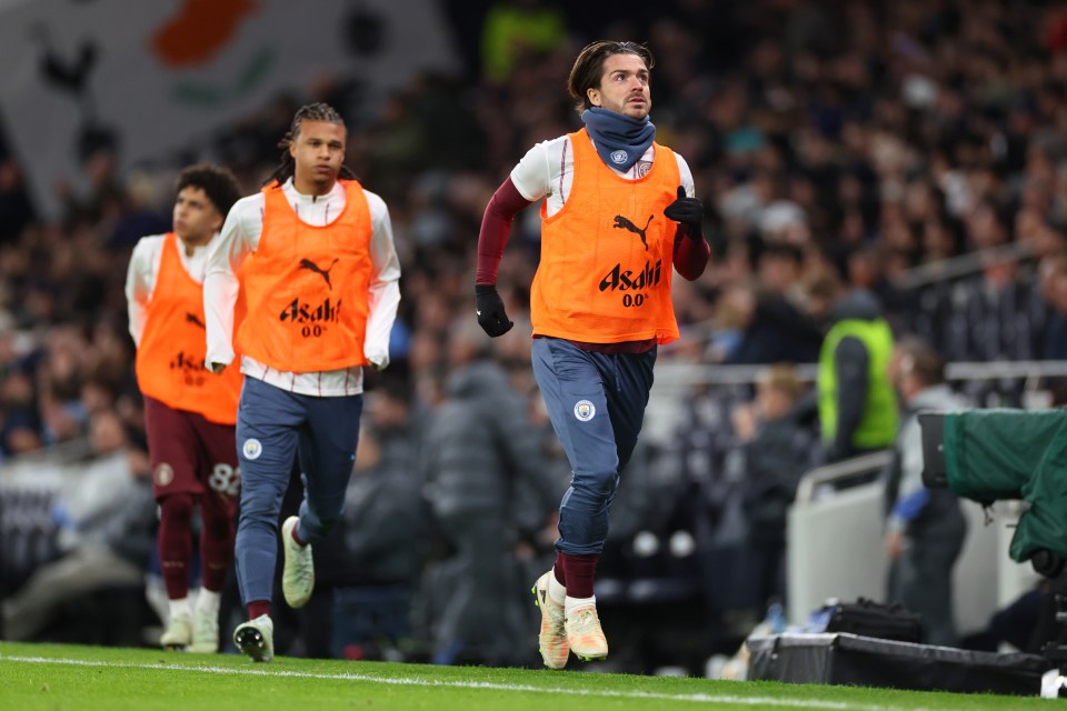 Jack Grealish and Erling Haaland of Manchester City on the bench.