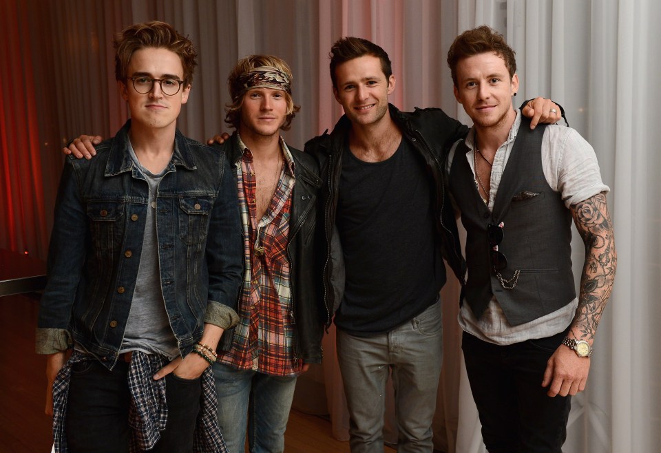 Photo of the band McFly at a party.