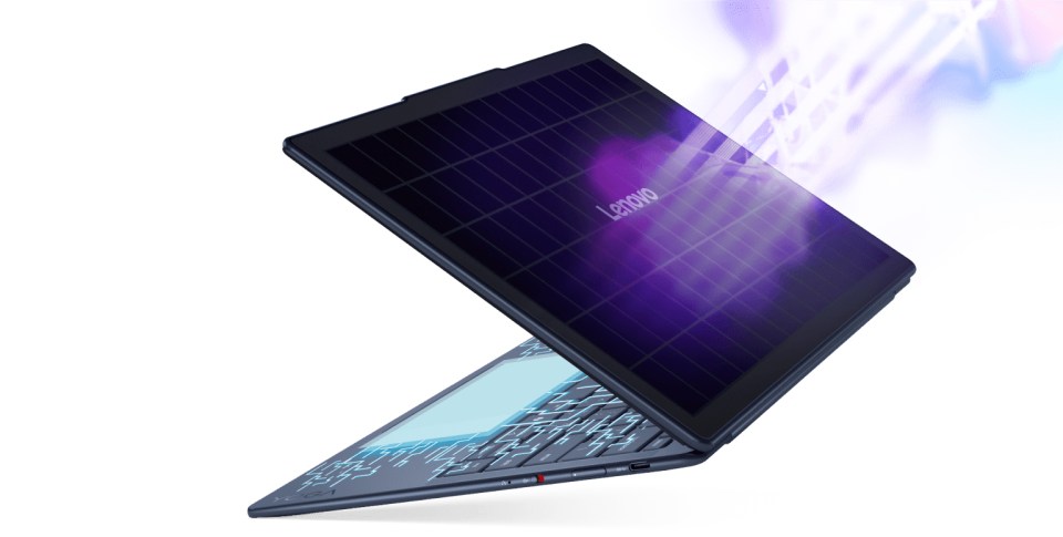Lenovo laptop with purple light effect.