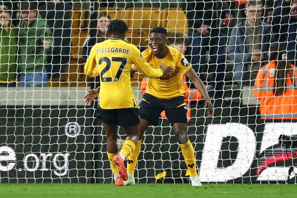 Wolverhampton Wanderers players celebrating a goal.