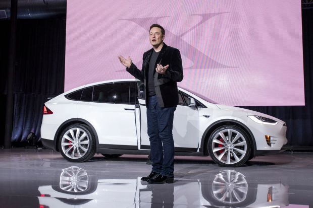 An image collage containing 1 images, Image 1 shows Elon Musk unveiling the Tesla Model X