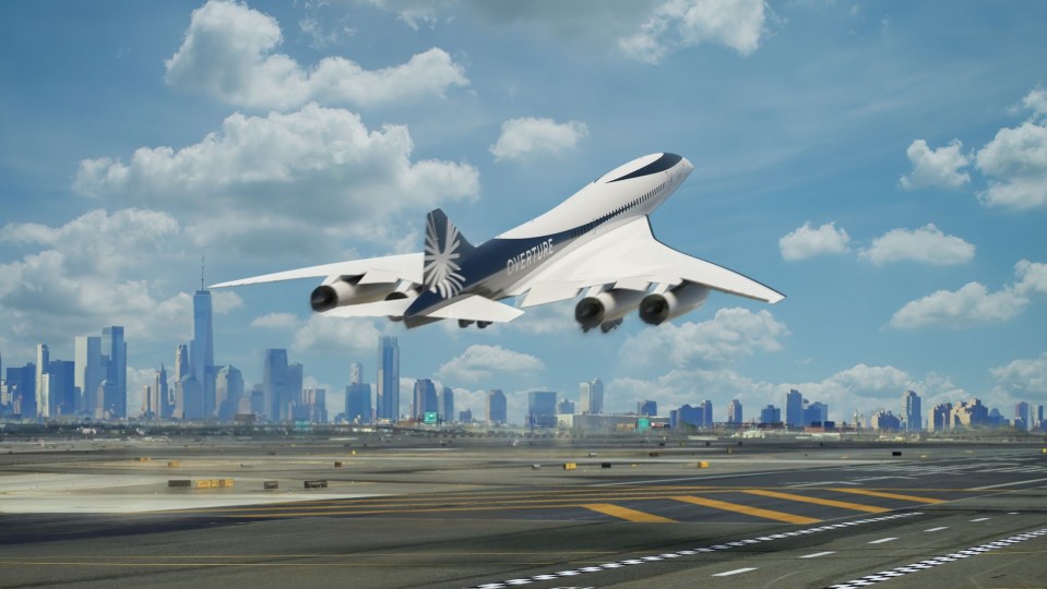 Overture supersonic aircraft landing over a city skyline.