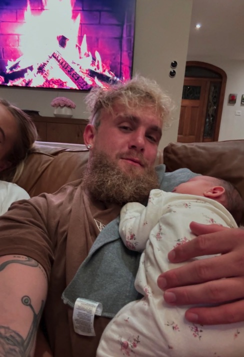 Man holding a baby.