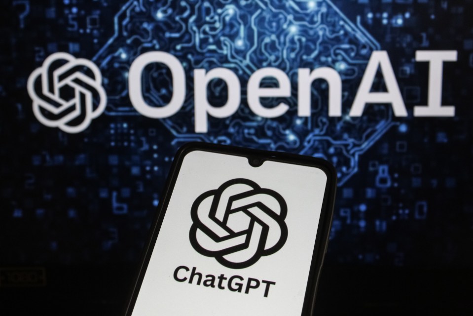 Photo illustration of the ChatGPT logo on a phone with the OpenAI logo in the background.