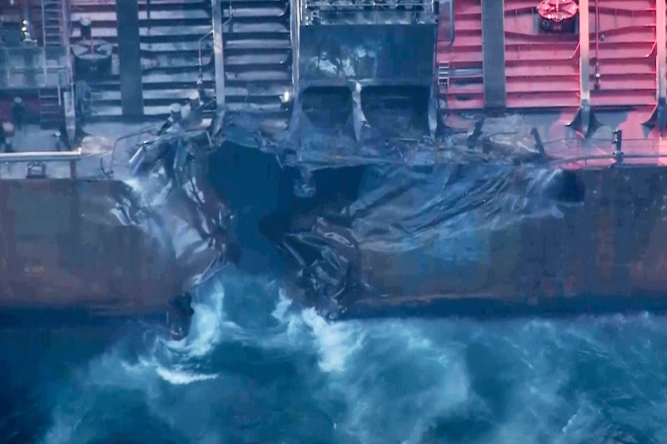 Damaged fuel tanker in the sea.