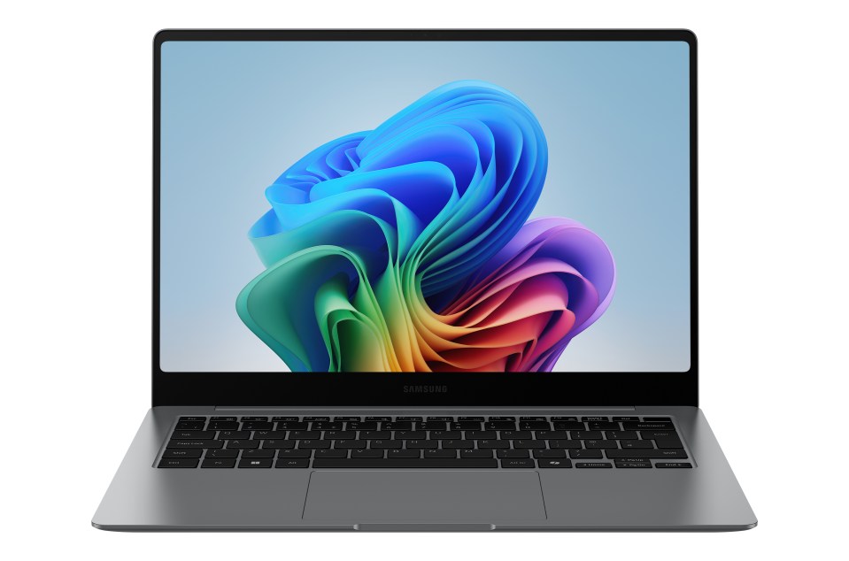 Samsung laptop with colorful abstract design on screen.