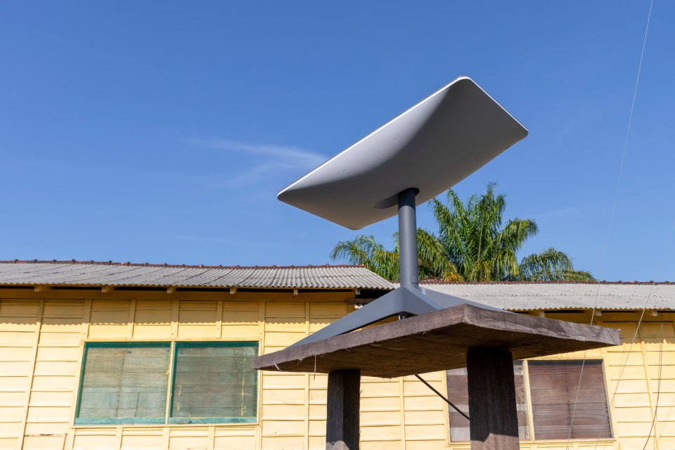 Starlink satellite dish providing internet access in the Amazon rainforest.