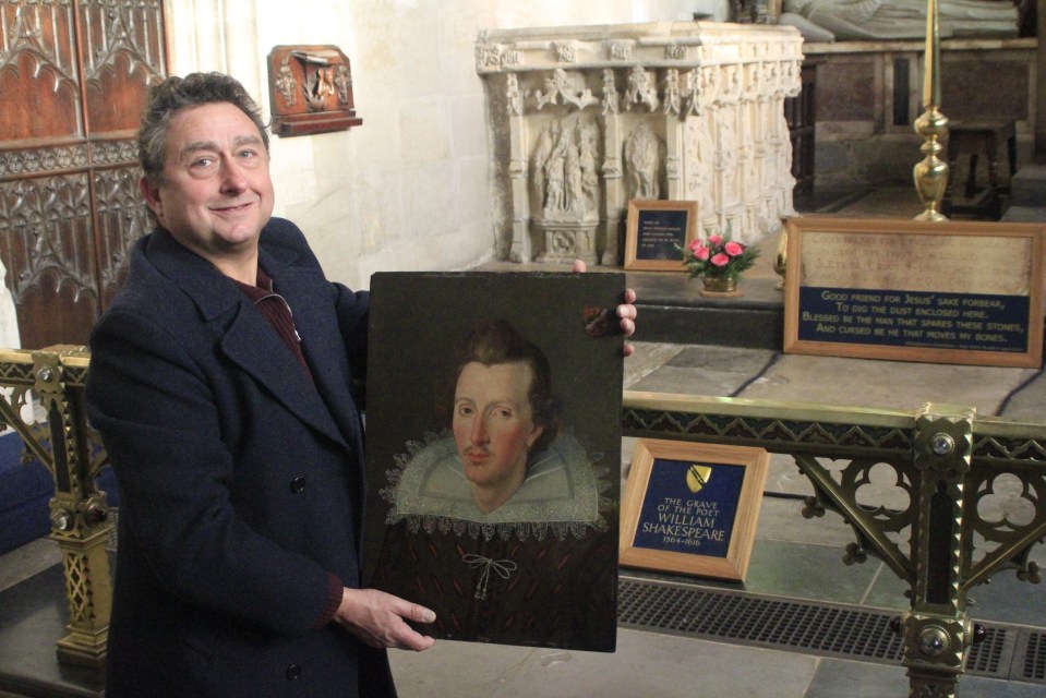 Man holding a portrait of Shakespeare at his grave.