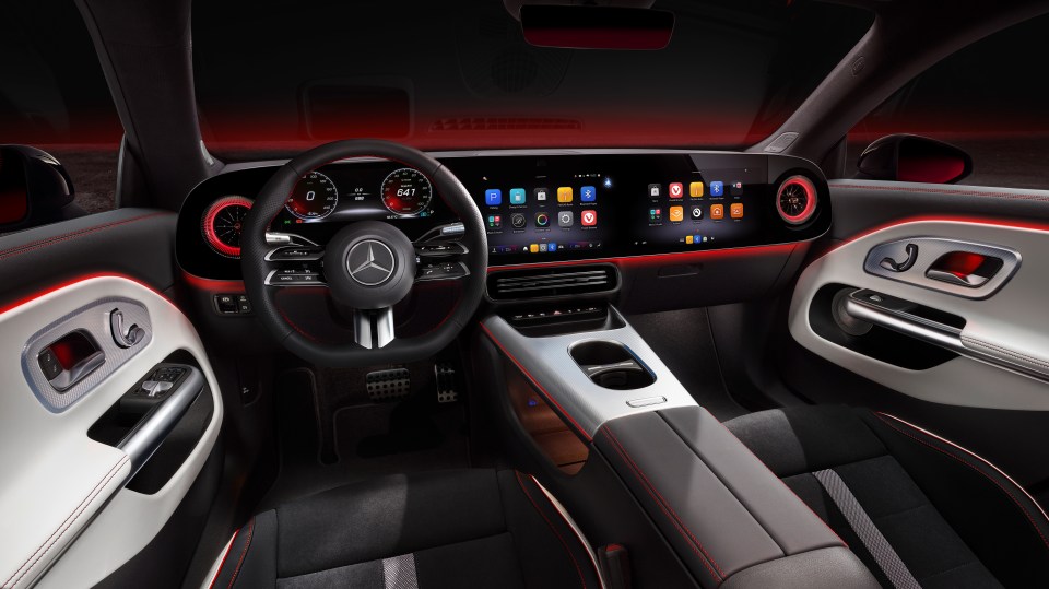 Mercedes-Benz interior with digital dashboard and steering wheel.