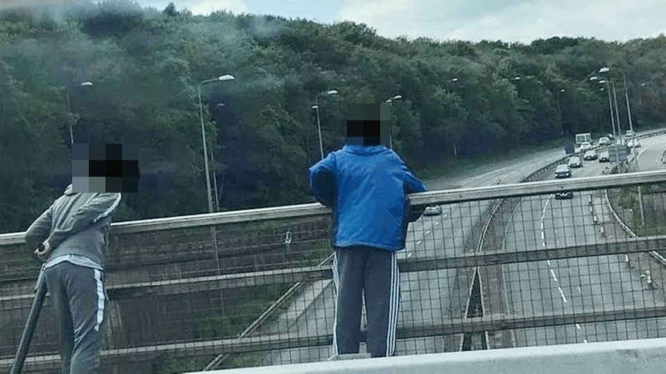 Man on damaged roof.