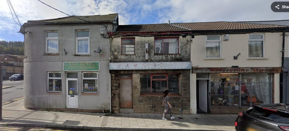Boarded-up shops in Maerdy, Wales.