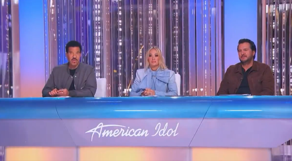 American Idol judges at the judges' table.
