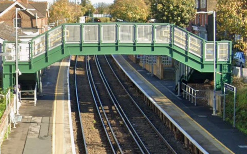 Westgate station footbridge over train tracks.