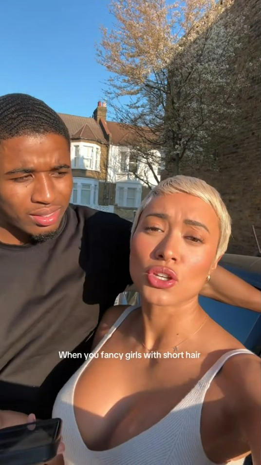 Woman with short blonde hair and a man.
