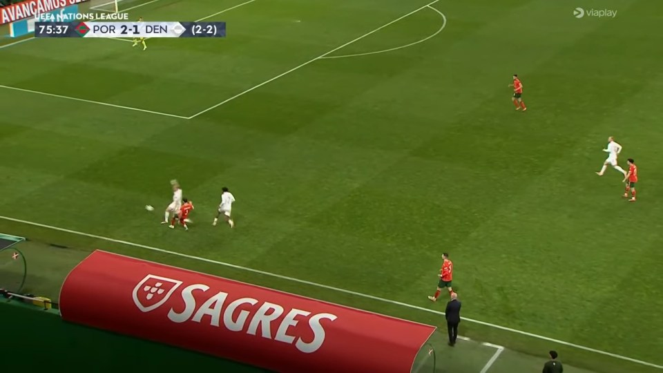 Screenshot of a soccer game, showing Ruben Dias' mistake during Portugal vs. Denmark.