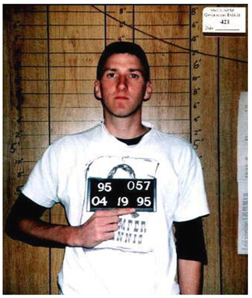 Timothy McVeigh in an orange jumpsuit.