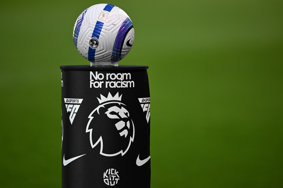 Soccer ball on a "No room for racism" plinth.
