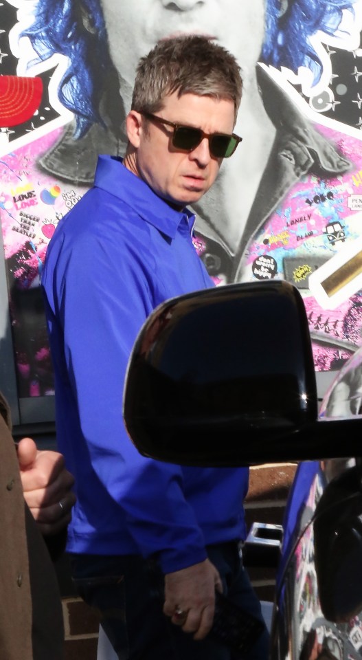 Noel Gallagher leaving recording studios in London.