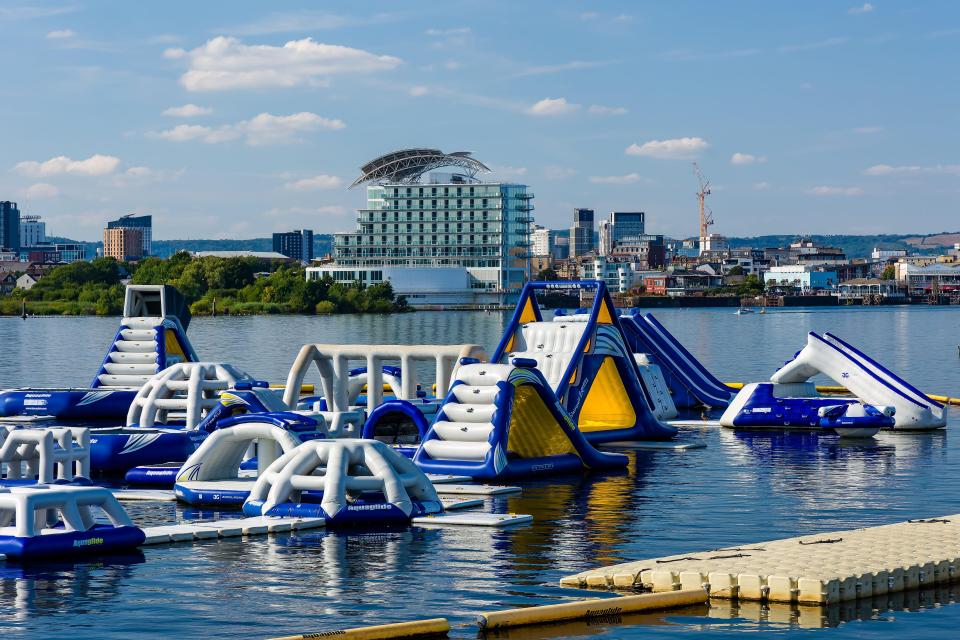 Inflatable aqua park in Cardiff Bay.