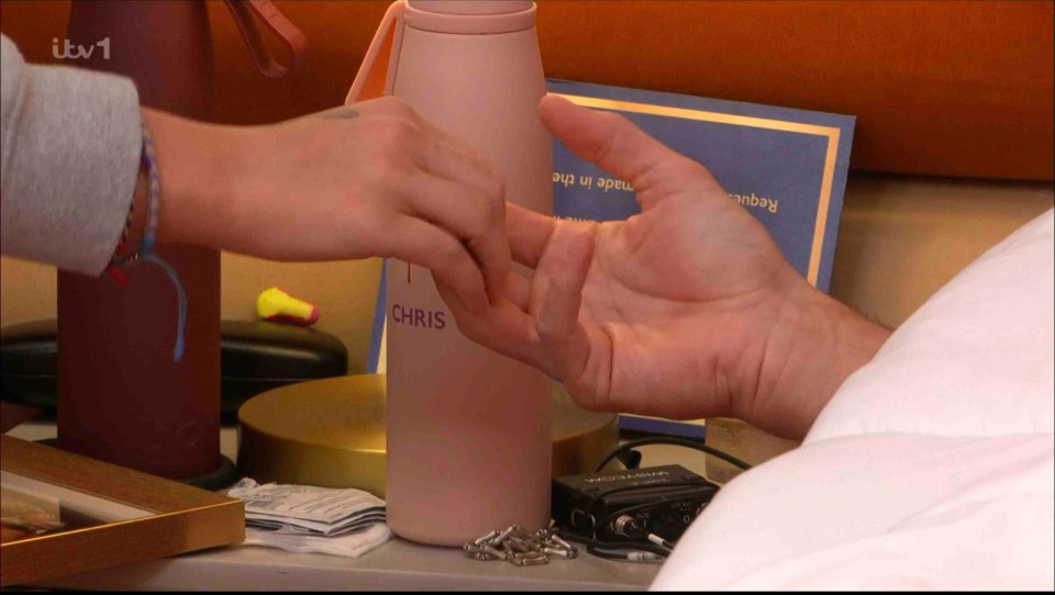Two people holding hands.