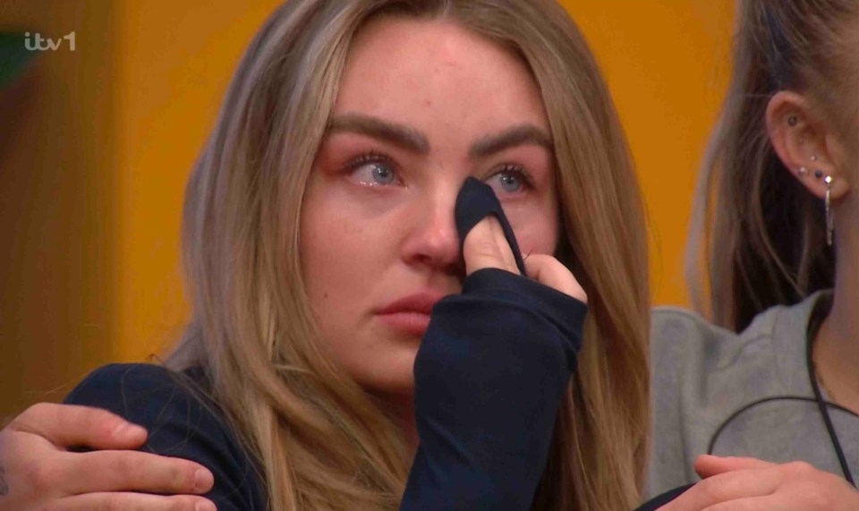 A woman crying during a Big Brother eviction announcement.