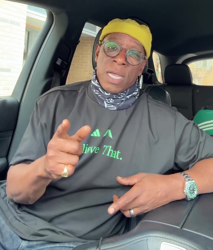 Ian Wright, football pundit, at a soccer match.