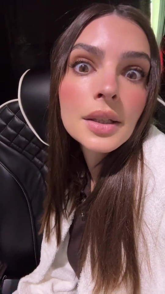 Emily Ratajkowski expressing disgust.