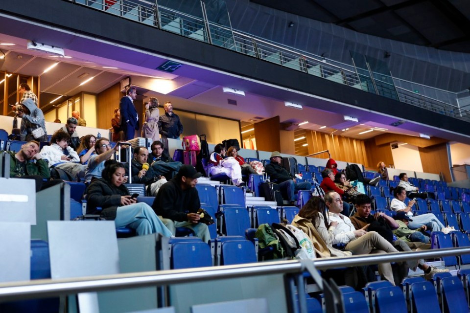 epa12061832 Some hundred stranded train passengers spend the night at a sport pavilion opened to host them amid a massive power outage that affected Spain and Portugal, in Madrid, Spain, late 28 April 2025 (issued 29 April 2025). A power blackout hit large parts of Spain and spread to neighboring Portugal and France on 28 April, disrupting transport systems, internet connections, and daily life, according to authorities. The exact cause of the outage is unknown. EPA/RODRIGO JIMENEZ