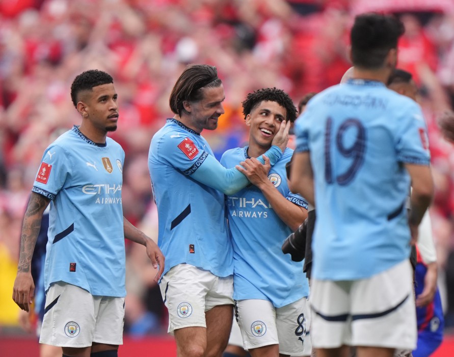 Manchester City's Jack Grealish (centre) and Manchester City's Rico Lewis (right) after the final whistle during the Emirates FA Cup Semi Final match at Wembley Stadium, London. Picture date: Sunday April 27, 2025. PA Photo. See PA story SOCCER Forest. Photo credit should read: Bradley Collyer/PA Wire. RESTRICTIONS: EDITORIAL USE ONLY No use with unauthorised audio, video, data, fixture lists, club/league logos or "live" services. Online in-match use limited to 120 images, no video emulation. No use in betting, games or single club/league/player publications.