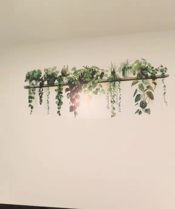 Wall decal of hanging plants.